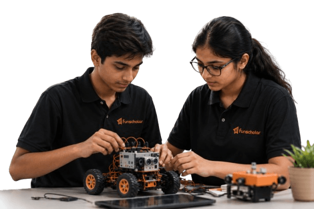 Two students building a robotics kit together
