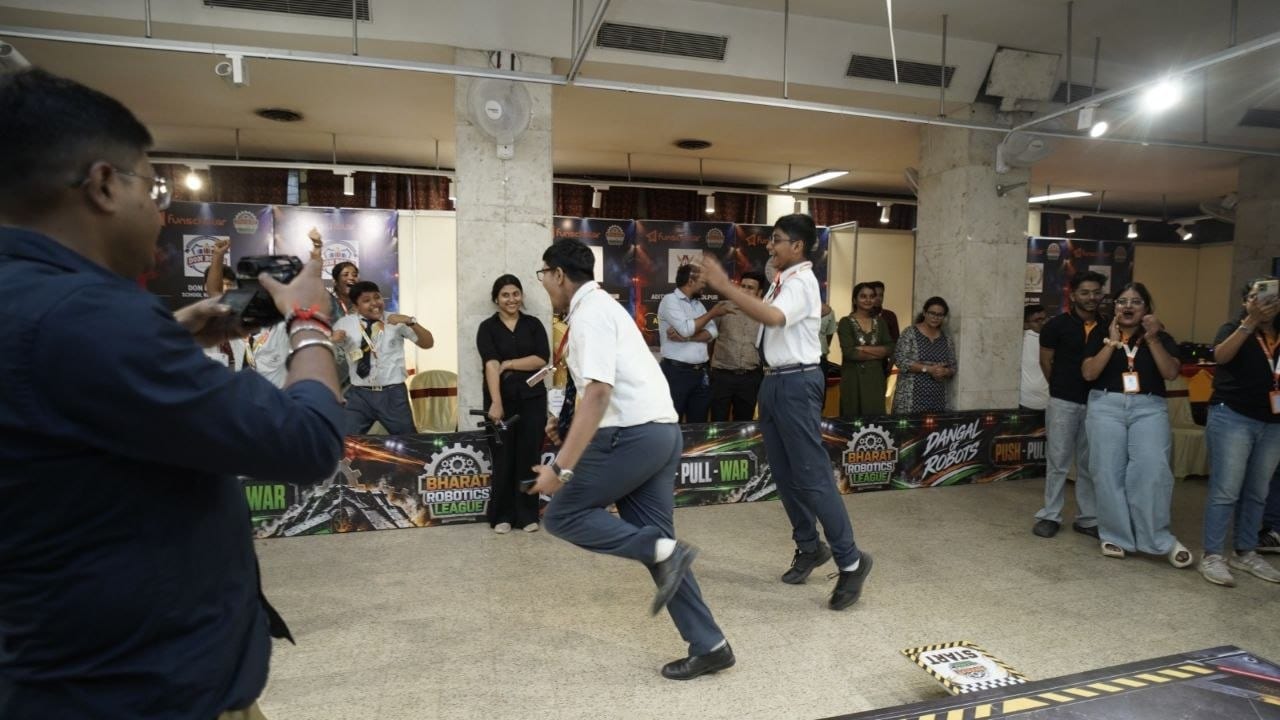 A match in progress as the crowd cheers on