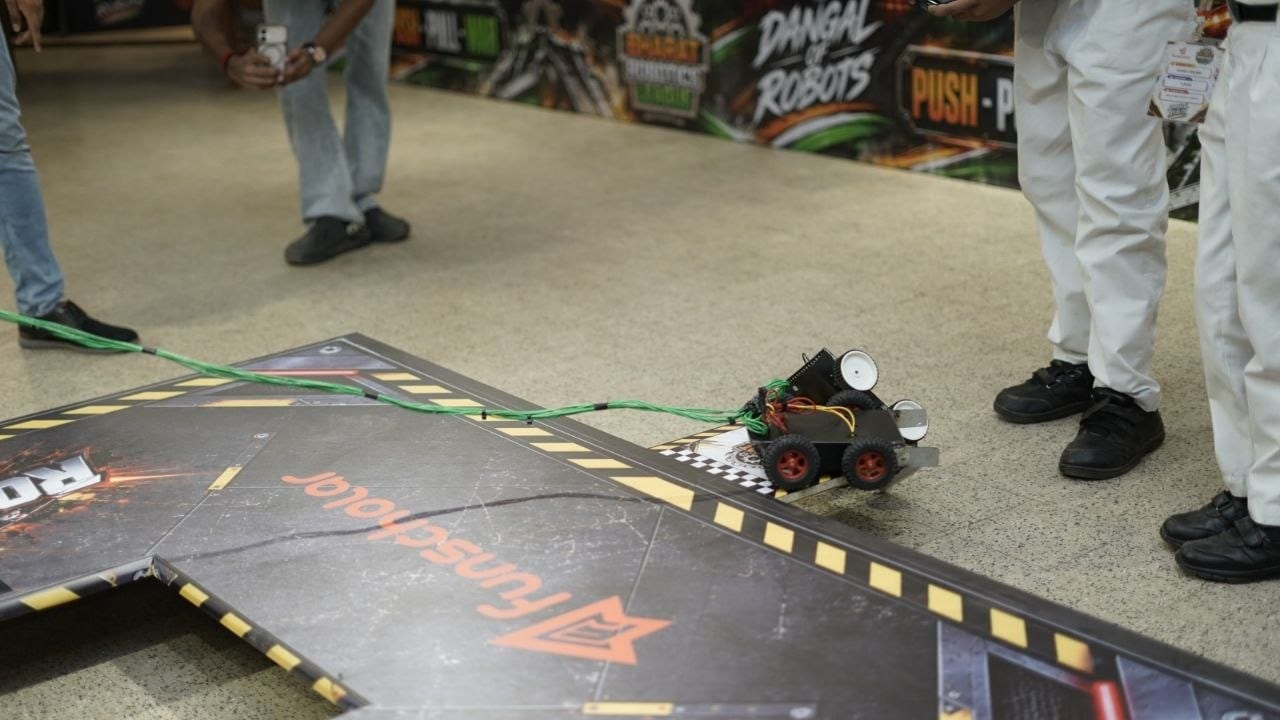 A robot pulling its load along the Robo-Pull track