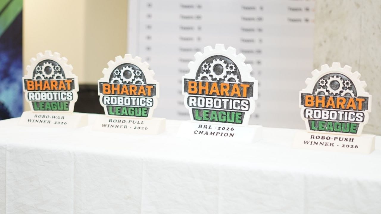 The four Bharat Robotics League 2026 trophies on the presentation table